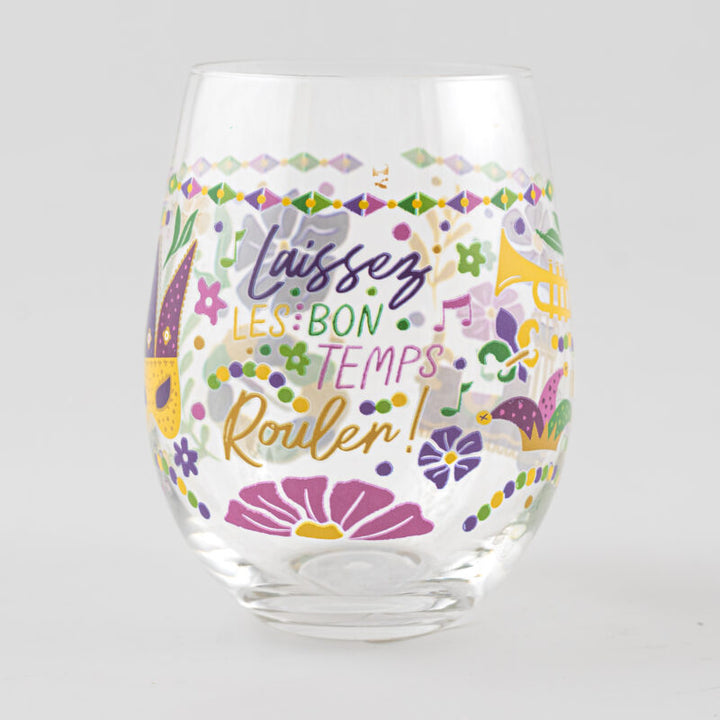 Hand-painted stemless wine glass featuring New Orleans Mardi Gras motifs including the Laissez Les Bon Temps Rouler script, a golden fleur-de-lis, and a yellow trumpet accented by vibrant purple and green bead patterns