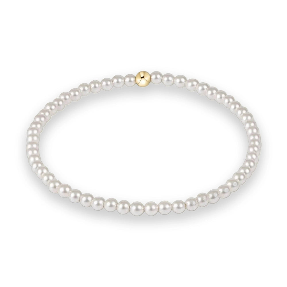 Pearl necklace with a gold clasp on a white background