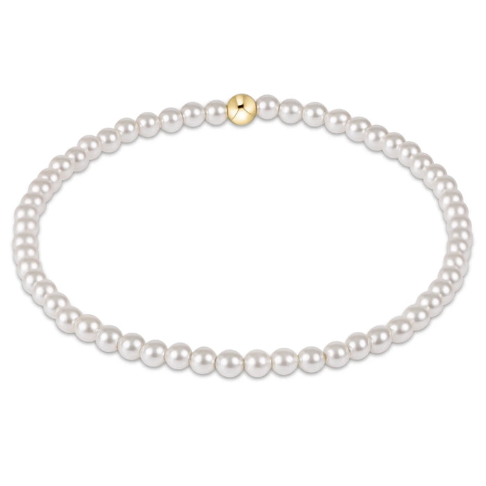 Pearl necklace with a gold clasp on a white background