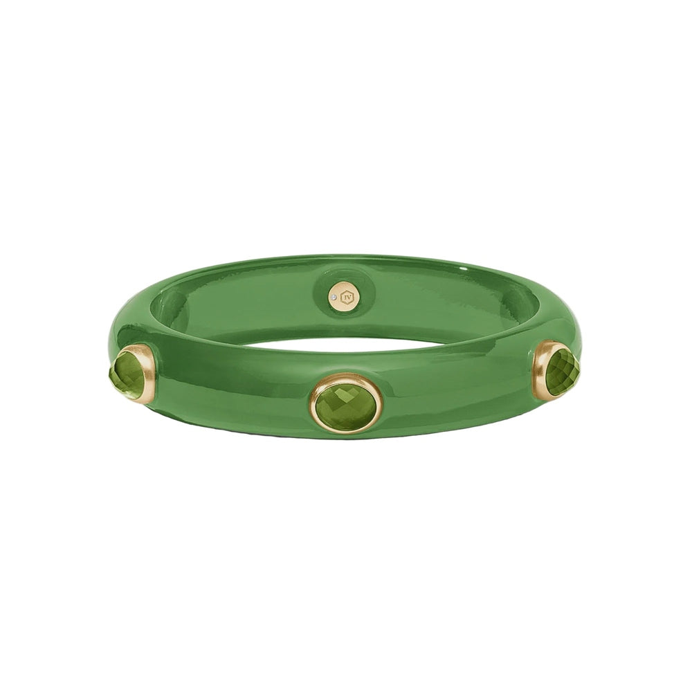 Handcrafted ceramic jewelry by Ippolita featuring a glossy forest green bangle bracelet centered on a white background with three faceted green gemstones in gold bezel settings and a visible interior hallmark
