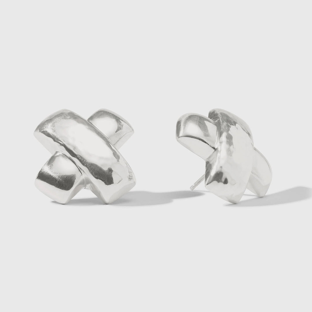 Sterling silver Paloma Picasso for Tiffany and Co earrings showcasing the iconic Graffiti kiss design on a neutral background with a high-polish mirror finish and rounded three-dimensional sculptural forms
