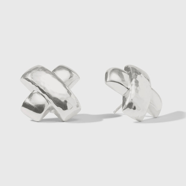 Sterling silver Paloma Picasso for Tiffany and Co earrings showcasing the iconic Graffiti kiss design on a neutral background with a high-polish mirror finish and rounded three-dimensional sculptural forms