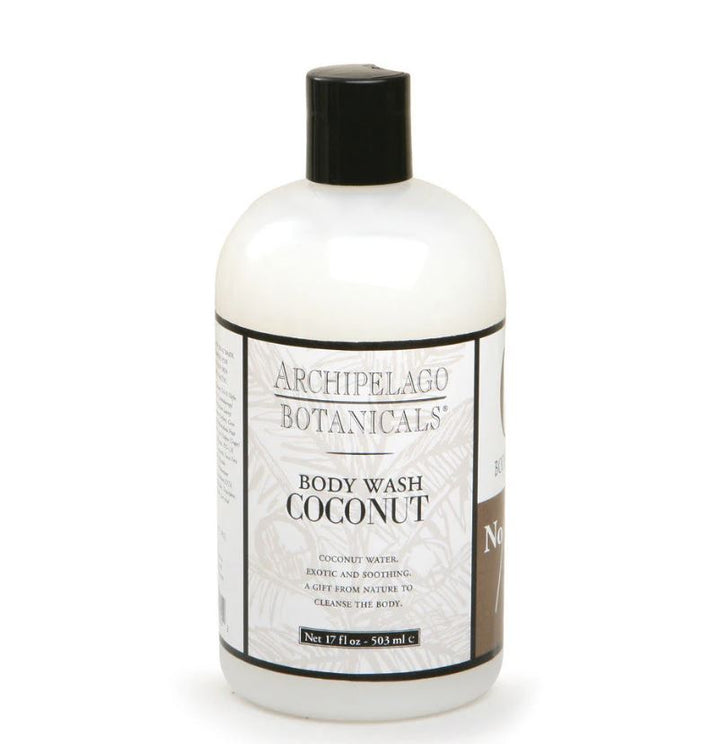 Product photograph by Archipelago Botanicals of a Coconut Body Wash bottle on a white background featuring a black flip-top cap, palm leaf decorative illustrations, and clear 17 fl oz text