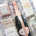 Gift set with Chandon champagne, socks, and other items in a box
