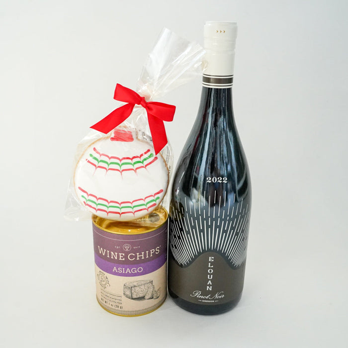 Bottle of wine and a bag of wine chips on a white background