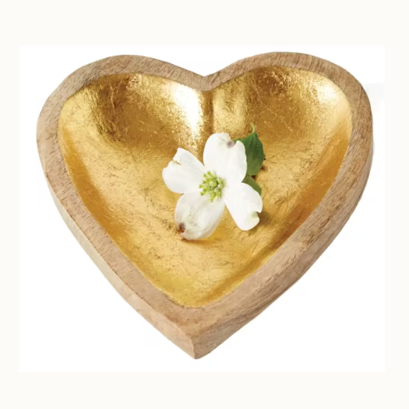 Handcrafted wood and gold leaf heart-shaped bowl featuring a delicate white dogwood flower with a lime green center and natural wood grain on a white background