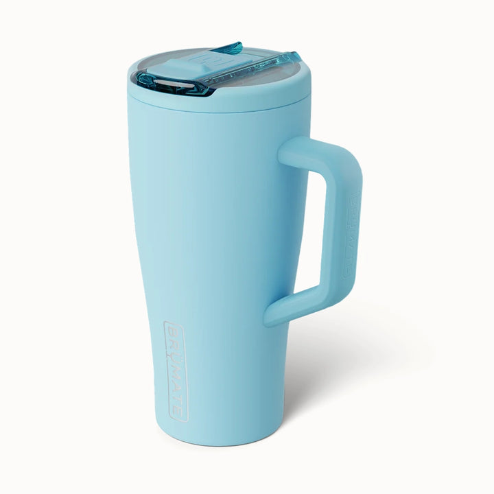 Product photograph of a BrüMate Era tumbler in sky blue featuring a matte finish, a clear leak-proof lid with a blue toggle, and a sturdy handle with embossed branding on a white background