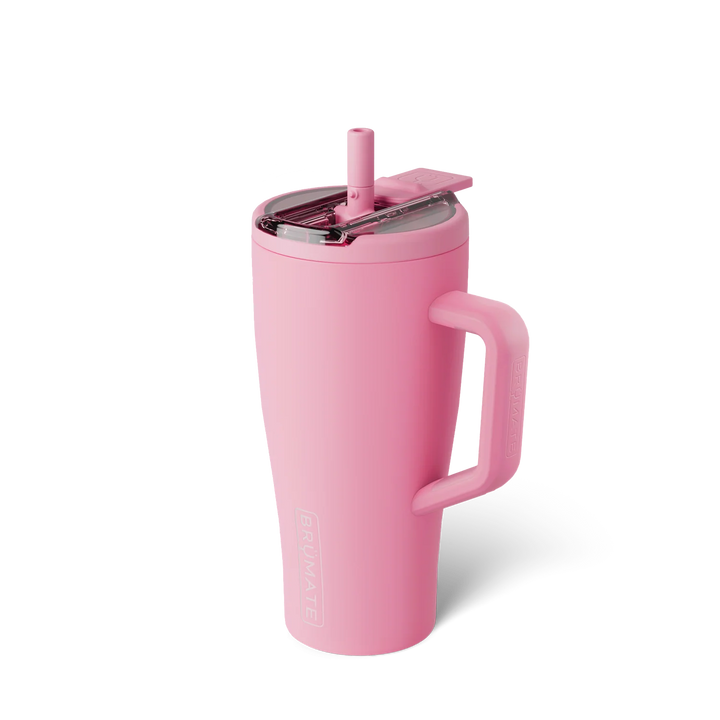 Product photograph by BrüMate of a pink Era tumbler centered on a white background featuring a matching pink straw, clear translucent lid, and a matte finish with an embossed brand logo