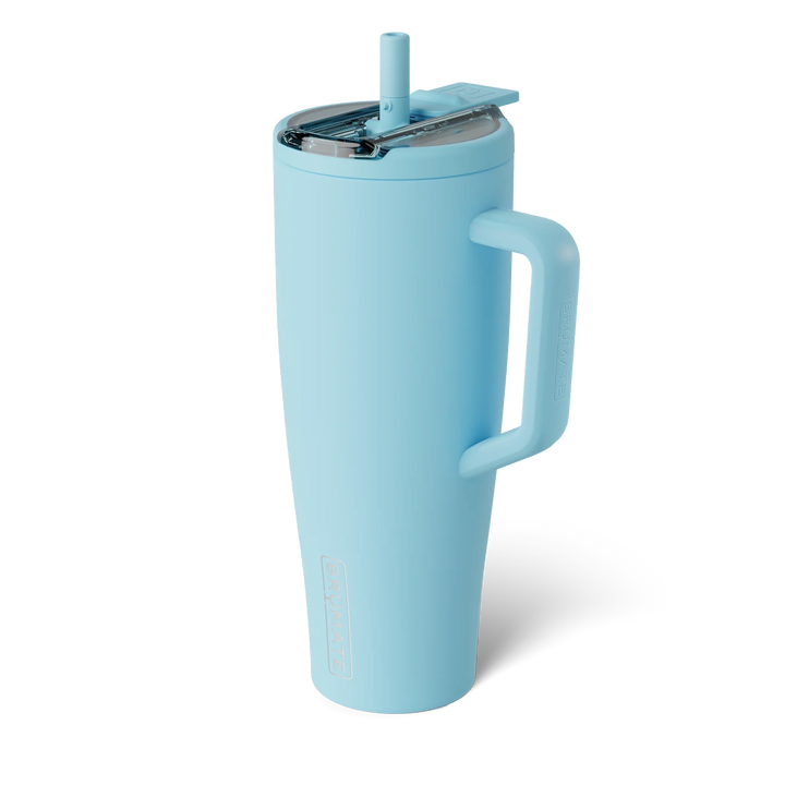 Product photograph by BrüMate of a light blue Era tumbler on a white background featuring a clear leakproof lid, a matching silicone straw, and an ergonomic handle with embossed branding
