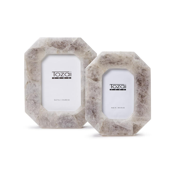 Natural smoky quartz picture frames by Tozai Home displayed on a white background, featuring an octagonal geometric shape, translucent crystalline textures, and neutral smoky gray veining