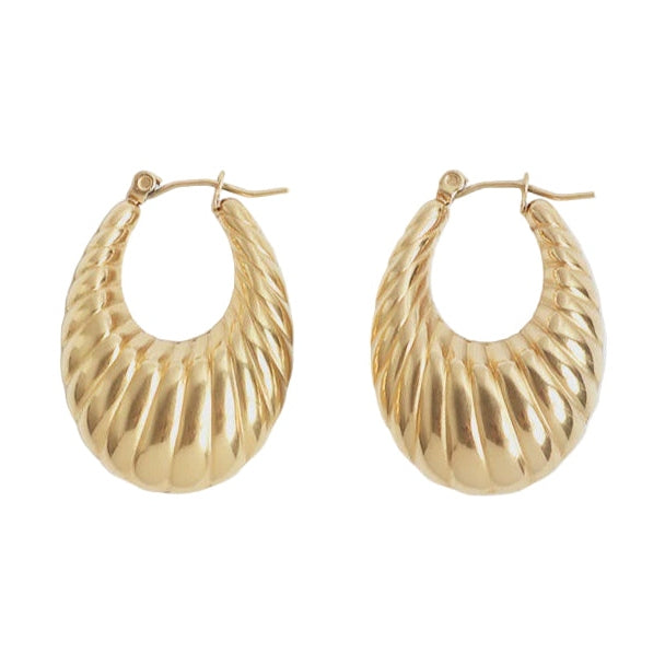 Gold jewelry pair of chunky croissant hoop earrings on a white background featuring a high-polish metallic sheen, vertical ribbed texture, and tapered teardrop shape