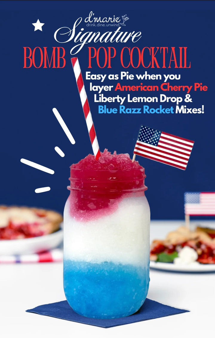 Digital promotional graphic by d’marie of a festive red, white, and blue layered Signature Bomb Pop Cocktail in a mason jar garnished with a miniature American flag and a red-and-white striped straw on a white tabletop