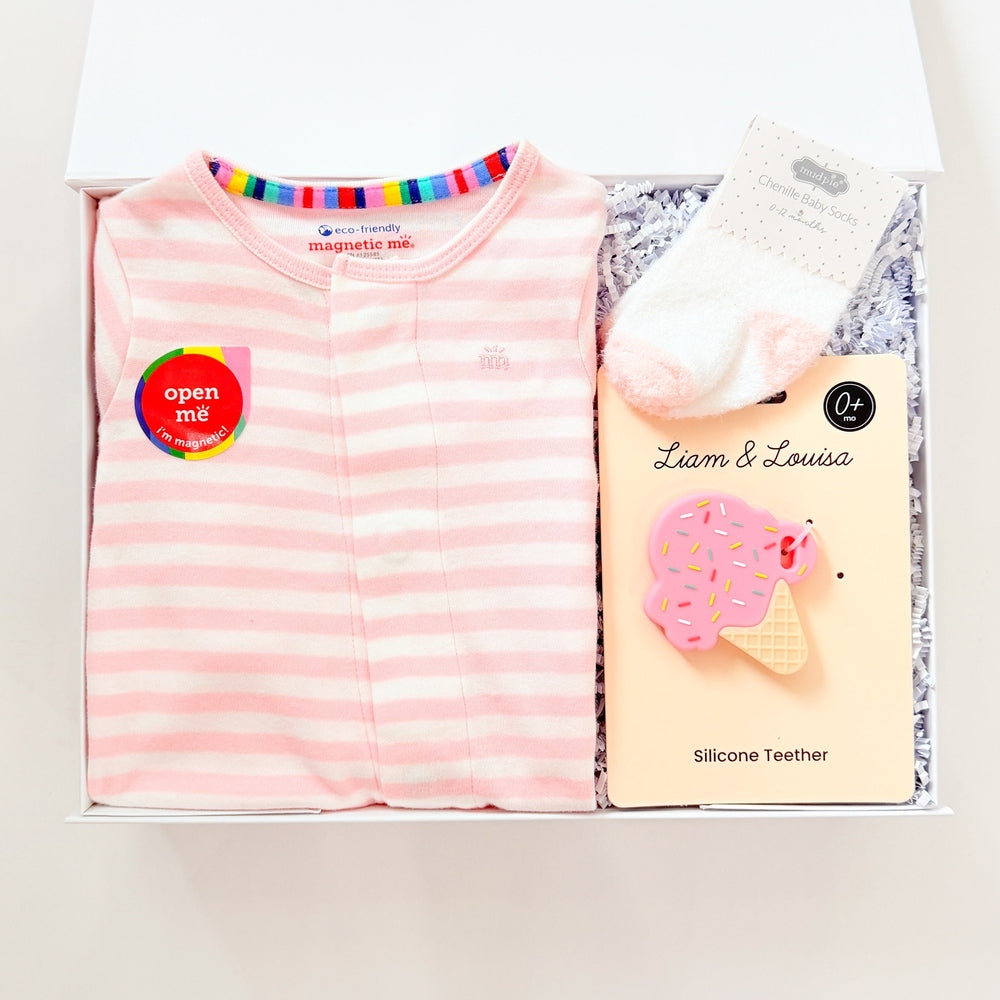 Pink striped shirt and white gloves in a box with 'Liew & Liew' branding.