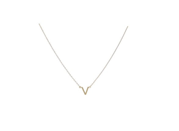 Gold jewelry necklace featuring a minimalist sans-serif letter V initial pendant suspended from a delicate fine link cable chain centered on a plain white studio background