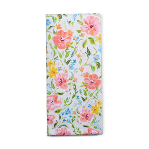 Watercolor-style printed textile floral tea towel featuring a pattern of vibrant pink blossoms, delicate sky-blue buds, and golden yellow wildflowers against a white background