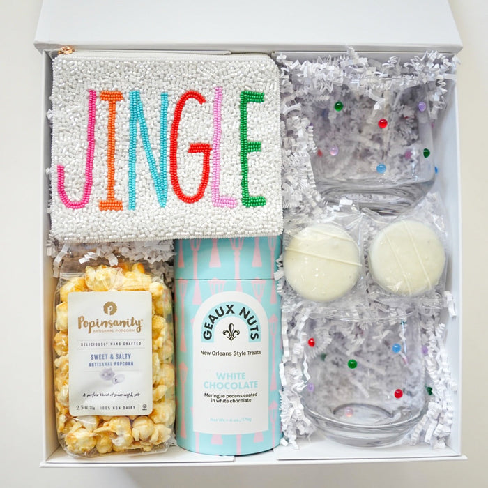 Gift set with popcorn, Gruel Nuts, and decorative items in a box labeled 'JINGLE'.
