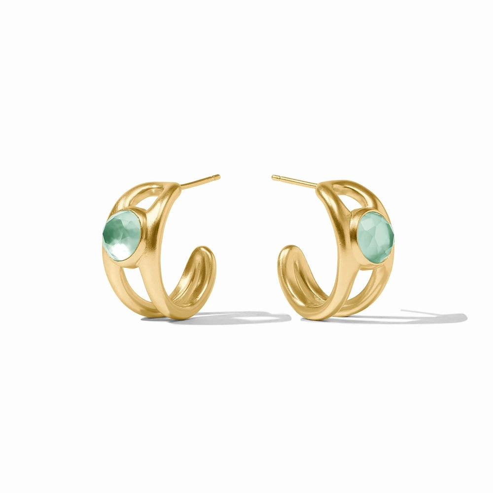 Gold-plated jewelry earrings by Julie Vos featuring a pair of matte-finished open double-band hoops set with faceted round seafoam green gemstones against a white studio background