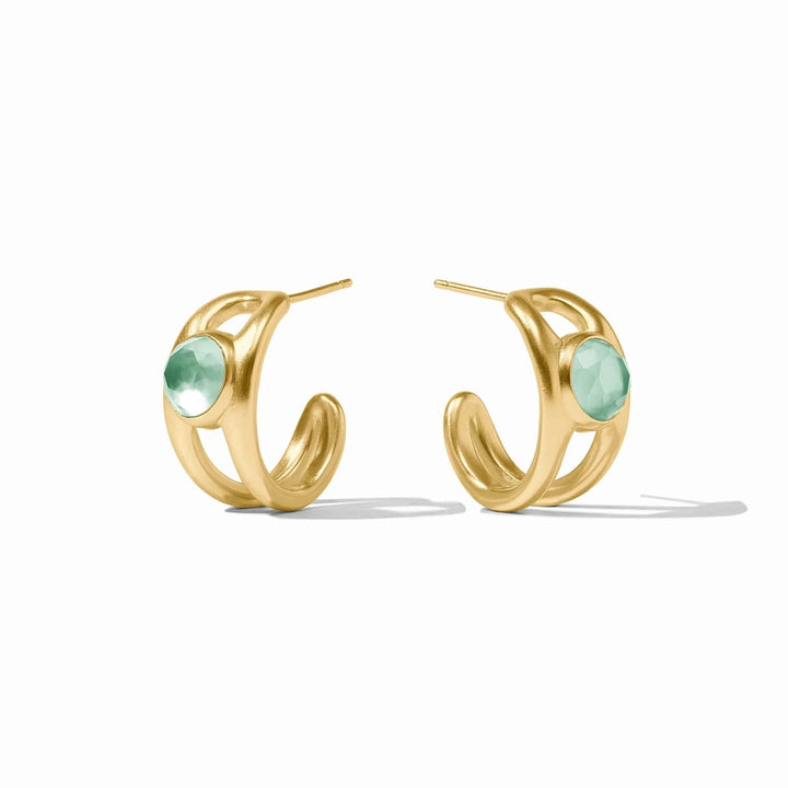 Gold-plated jewelry earrings by Julie Vos featuring a pair of matte-finished open double-band hoops set with faceted round seafoam green gemstones against a white studio background