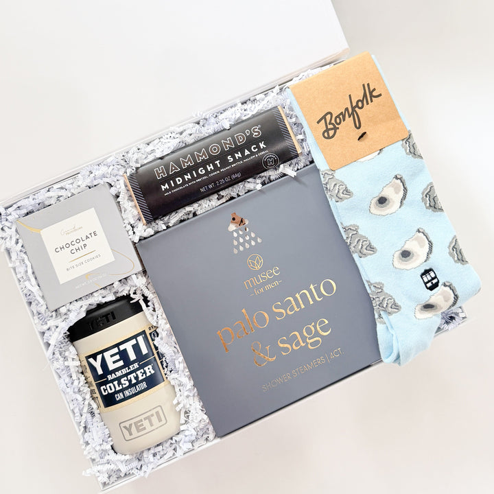 Gift set with YETI cup, Palo Santo &amp; Sage box, and other items on a white background