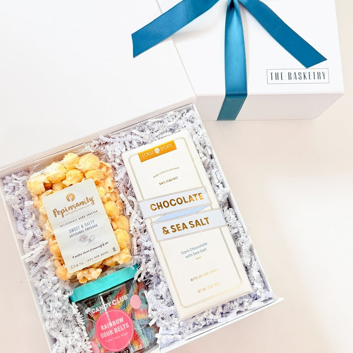 Celebration gift box for all occasions with snacks sweet and salty.