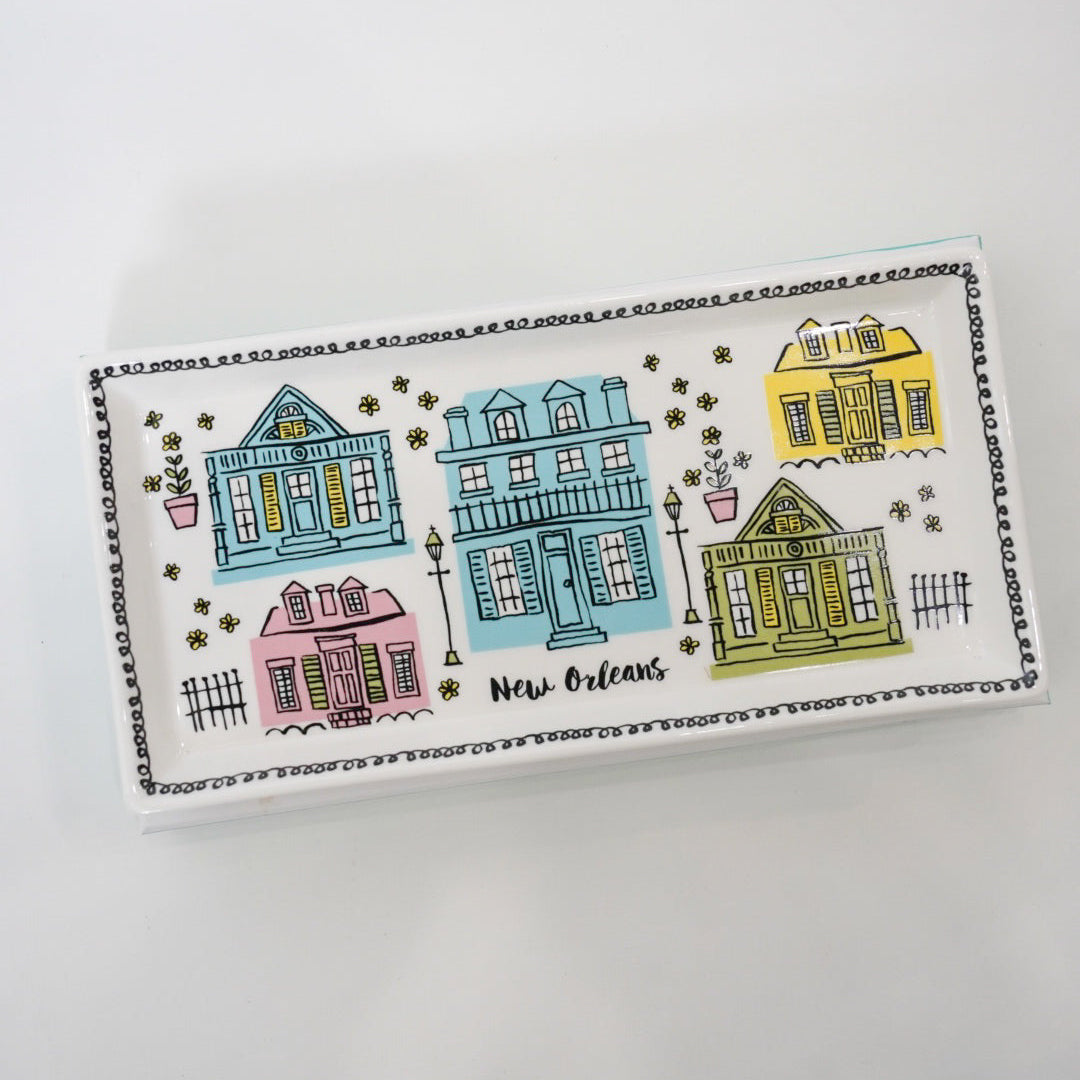 Rectangular tray with colorful illustrations of houses and &