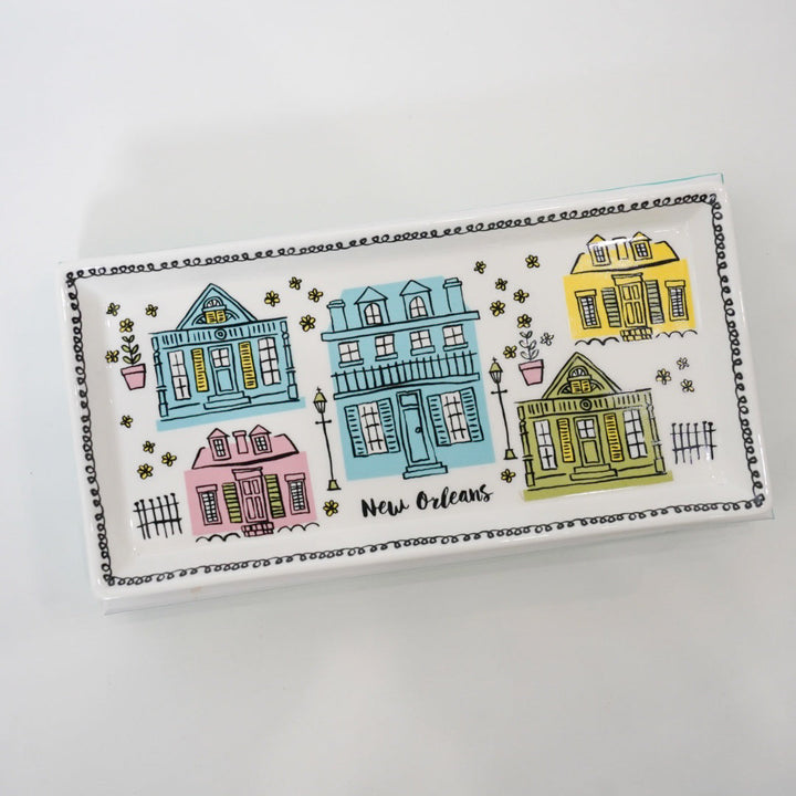 Rectangular tray with colorful illustrations of houses and &