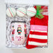 Gift set with mug, candy, and socks in a box