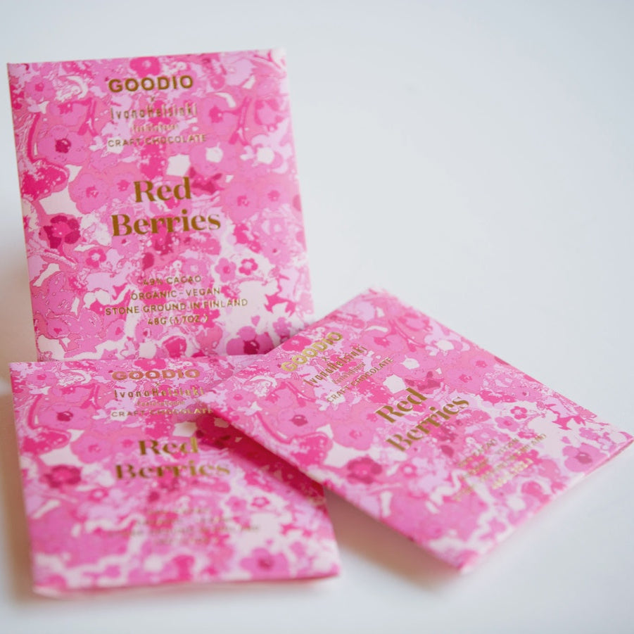 Three Goodio Red Berries chocolate bars in pink floral packaging