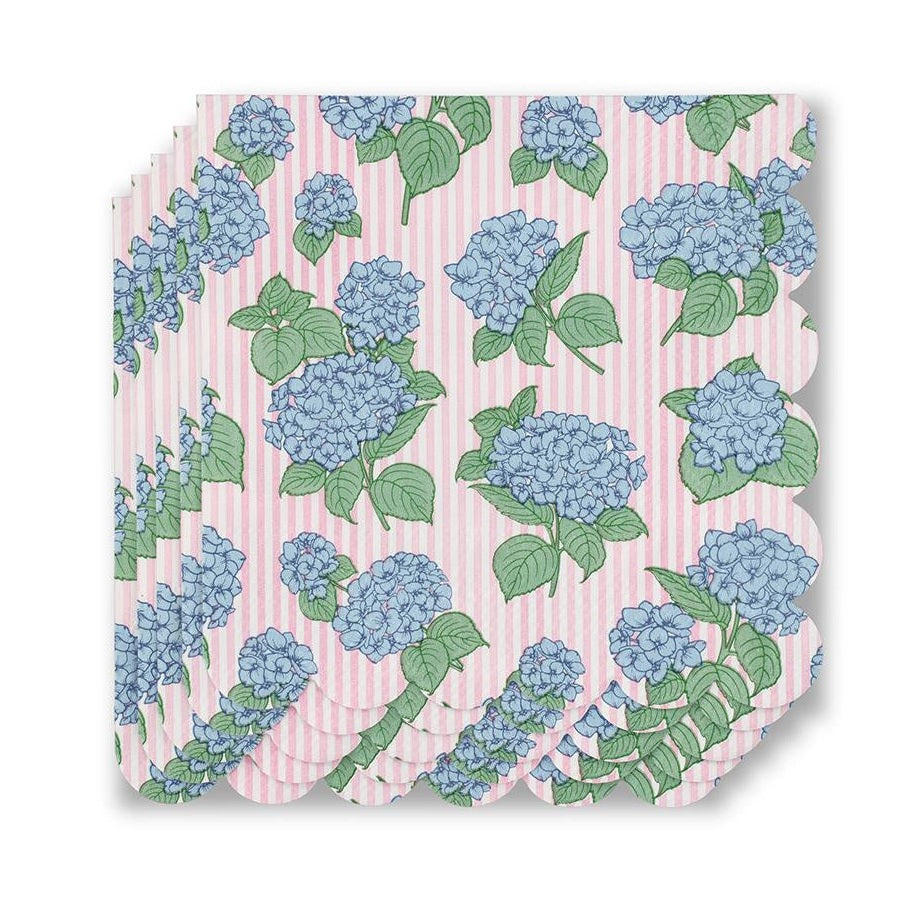 Printed paper napkins featuring a repeating pattern of blue hydrangea blossoms and green leaves against a backdrop of pink and white vertical stripes with decorative scalloped edges