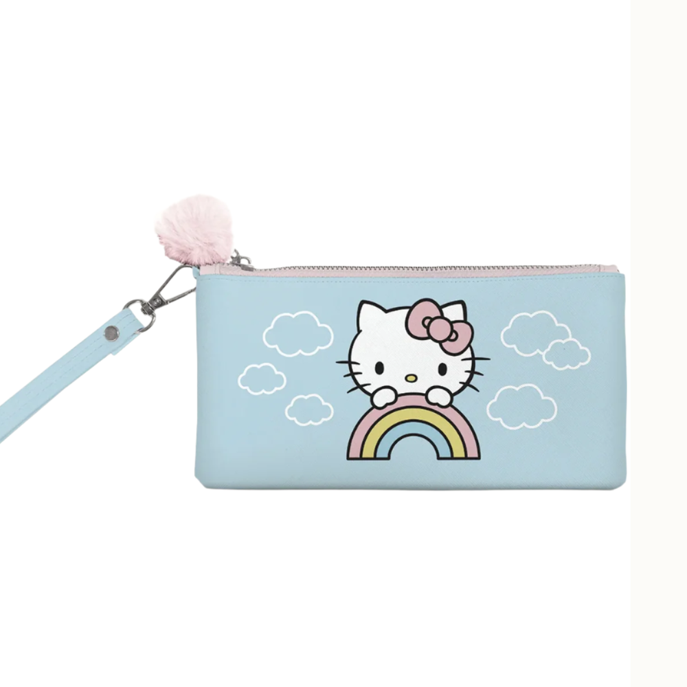 Sanrio faux leather wristlet featuring Hello Kitty peeking over a pastel rainbow against a light blue sky with white clouds, detailed with a pink fuzzy pom-pom and matching wrist strap