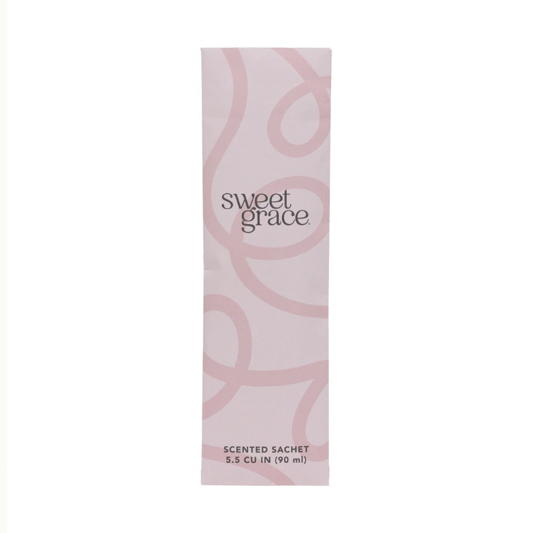 Graphic design by Bridgewater Candle Company featuring a pale pink Sweet Grace scented sachet on a white background with elegant darker pink swirling patterns and minimalist grey serif typography specifying the 90 milliliter volume