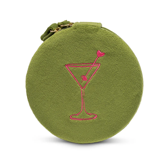 Olive green velvet round jewelry pouch featuring a pink embroidered martini glass with a heart-tipped stirrer and gold-tone zipper hardware centered on a white background