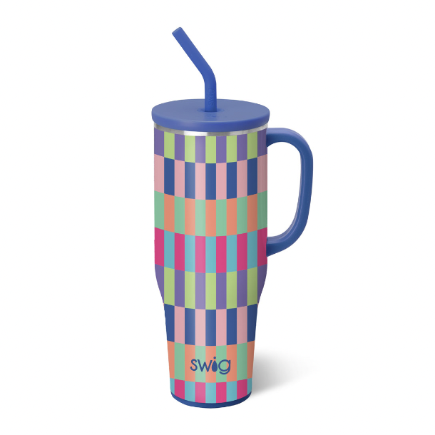 Stainless steel tumbler by Swig Life, this insulated travel mug features a vibrant multi-colored geometric checkerboard pattern on a white background with a royal blue lid and matching curved straw
