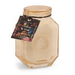 Paddywax Cotton and Teak soy wax candle in a peach-hued hexagonal glass jar featuring an embossed P logo and a decorative floral hangtag tied with a black cord