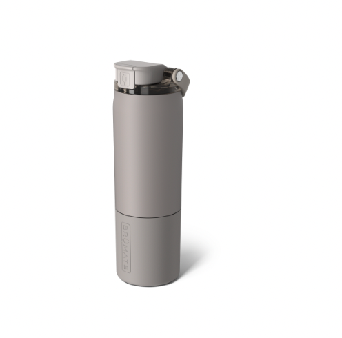 Product photograph by BrüMate of a Rehydration reusable water bottle on a white background featuring a matte taupe finish, a flip-top lid with a locking latch, and an embossed vertical logo