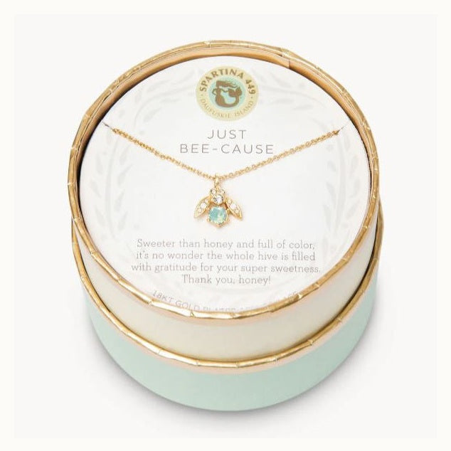 18kt gold plated necklace by Spartina 449 featuring a bee pendant with a seafoam green stone and crystal-studded wings displayed inside a round gift box with the brand&