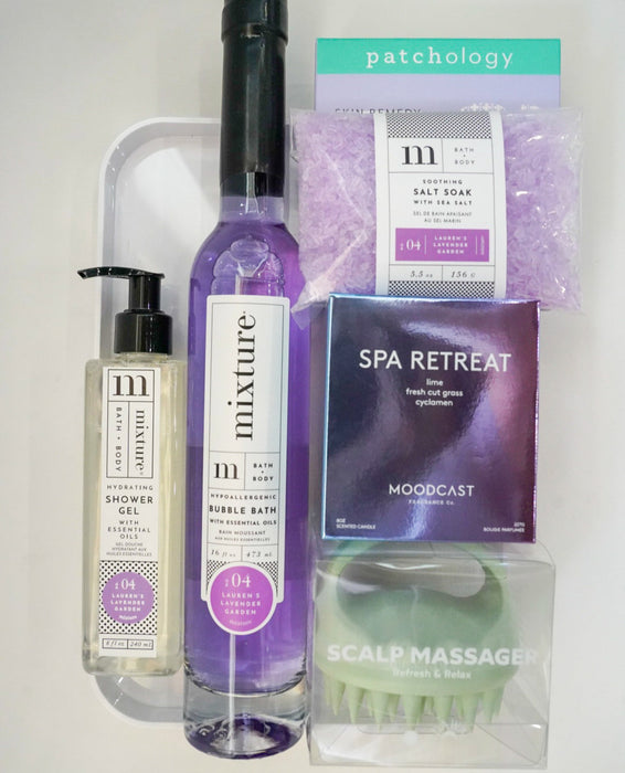Collection of bath and body products including a bottle labeled 'mixture' and a box labeled 'patchology'.