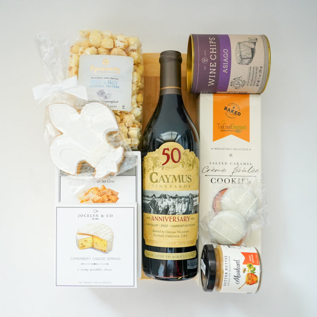 Wine bottle with snacks and cookies on a white background