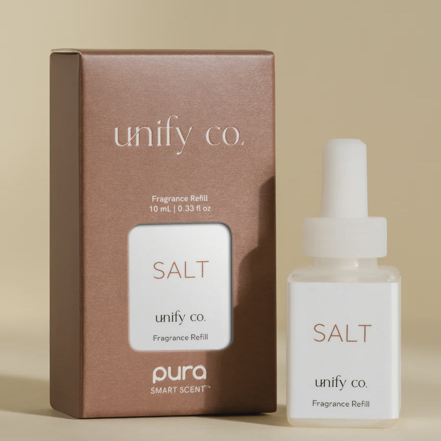 Product photography of the Unify Co. Salt Fragrance Refill for Pura Smart Scent featuring a minimalist brown box beside a square white vial with clean black typography against a soft beige background