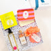 Gift set with skincare products and a soap on a white background