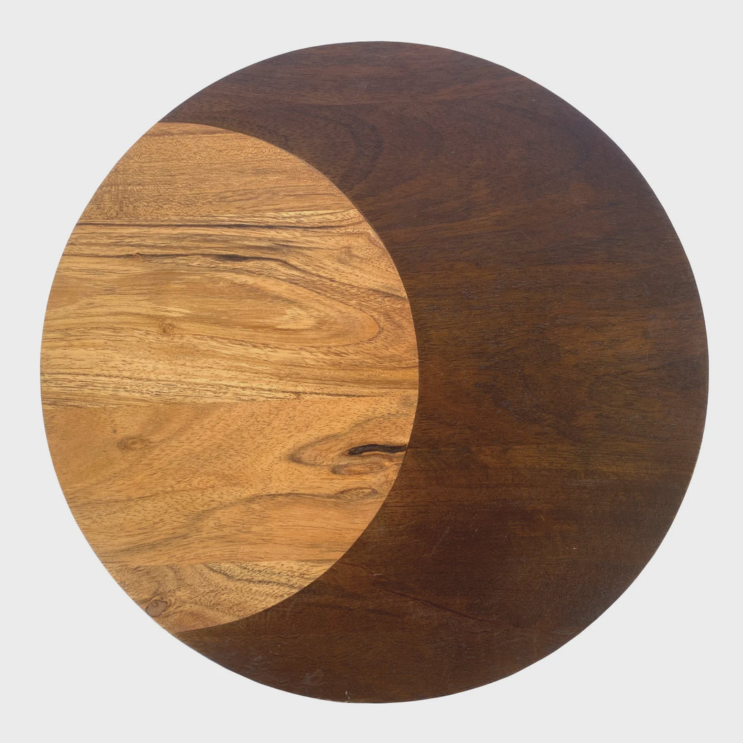 Handcrafted wood wall art showcasing a circular composition with a light honey-toned crescent moon shape against a white background featuring a smooth curved division and a dark espresso-stained wood finish with visible natural knots