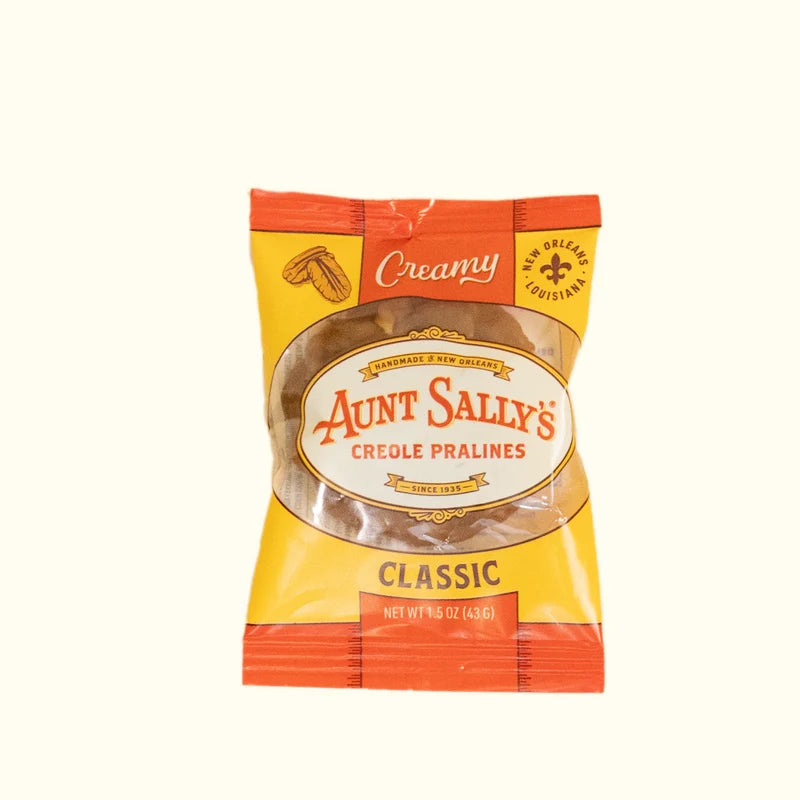 Aunt Sally's Creole Pralines Creamy Classic praline in an orange and yellow wrapper, 1.5 oz
