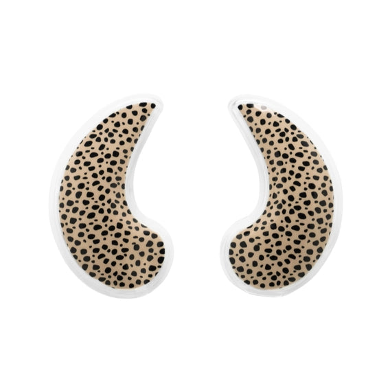 Product photograph of a pair of leopard print gel eye masks centered on a solid white background featuring black spotted patterns on a beige surface and clear translucent gel edges