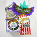 Mardi Gras-themed items including a mask, king cake, and spicy crawfish packaging on a white background