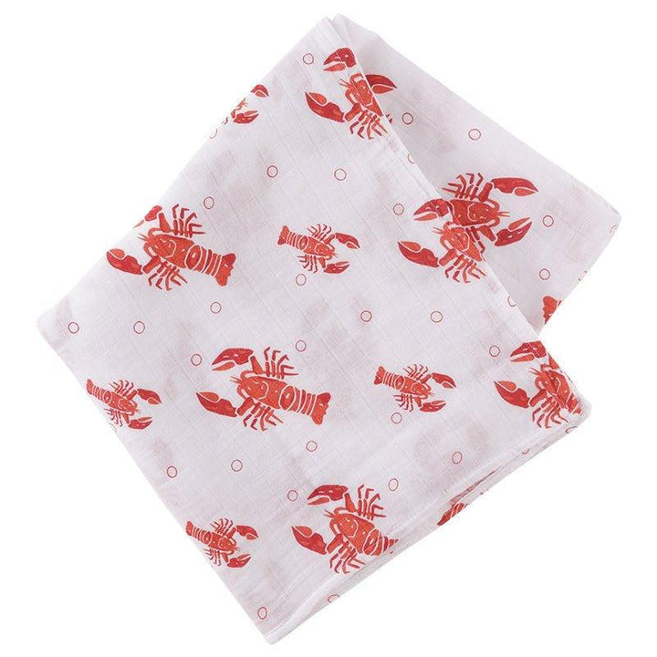 Muslin cotton fabric swaddle blanket featuring a repeating nautical pattern of vibrant red lobsters with detailed claws and tiny pink bubbles folded against a white background