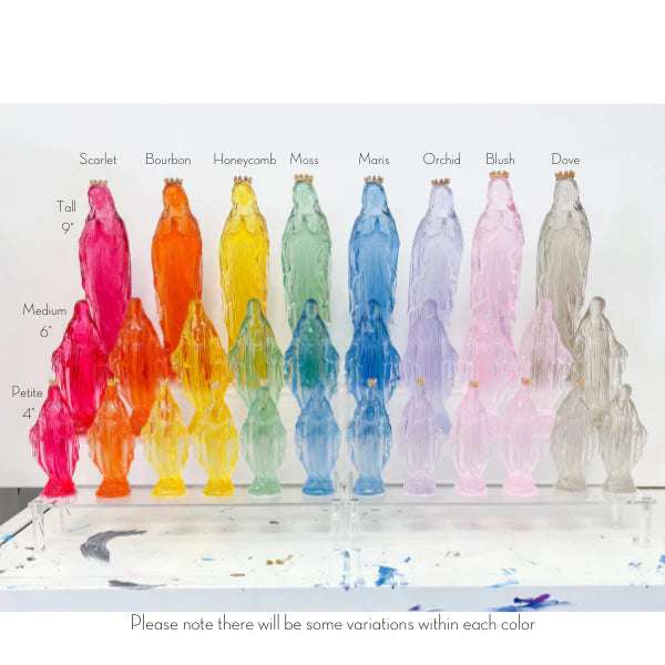 Resin Virgin Mary sculptures in a rainbow of translucent shades from Scarlet to Dove, featuring delicate gold crowns and standing in tall, medium, and petite sizes on a clear acrylic display stand