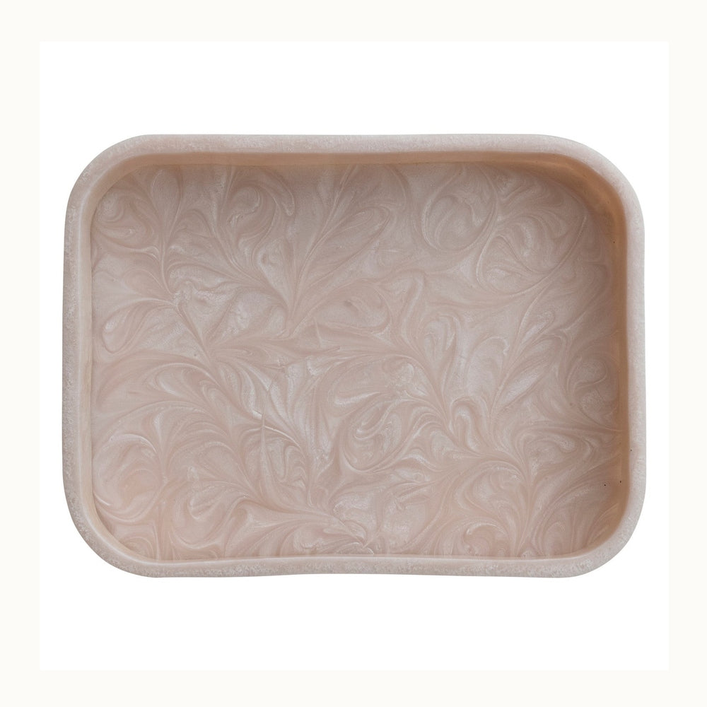 Resin rectangular tray featuring iridescent champagne swirls, a soft blush pink hue, and smooth rounded corners isolated on a white background