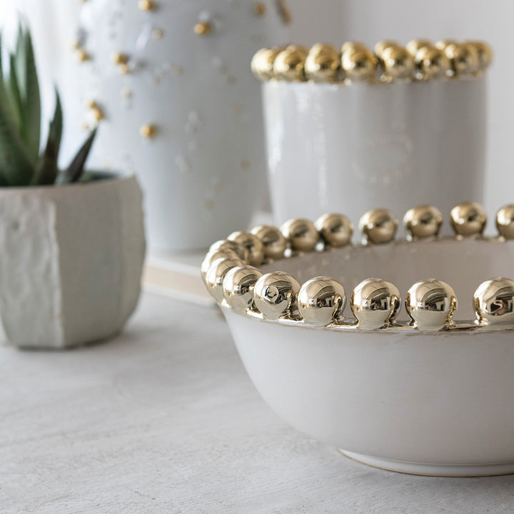 Handcrafted ceramic bowl and vessels by L&