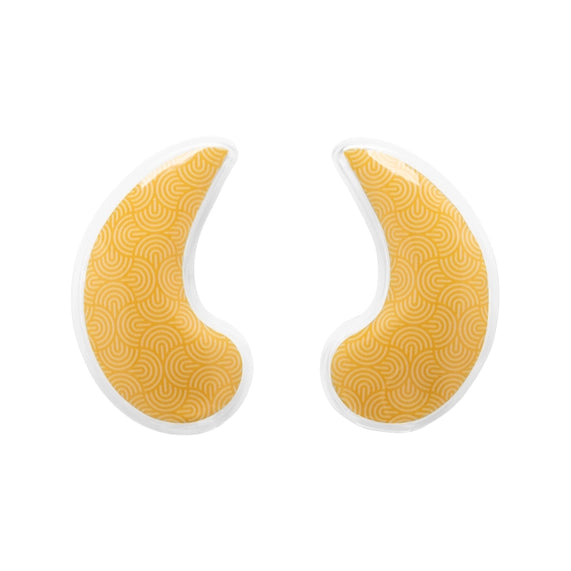 Studio product photograph of a pair of yellow crescent-shaped under-eye gel patches on a white background featuring a white concentric wave pattern and clear outer borders