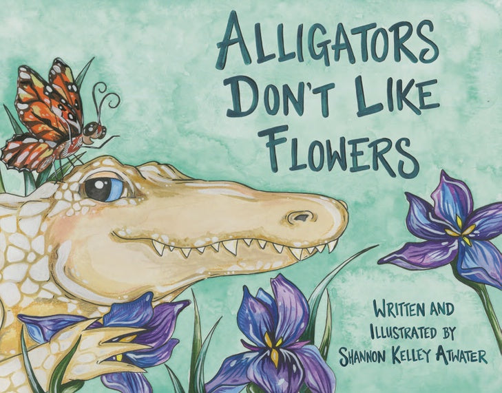 Watercolor and ink book cover illustration by Shannon Kelley Atwater for Alligators Don't Like Flowers featuring a smiling alligator with blue eyes in a marsh with a monarch butterfly on its head and vibrant purple irises